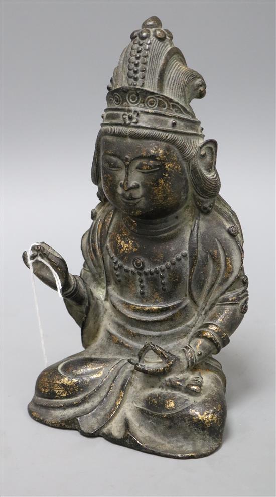 A Chinese bronze seated figure of Guanyin height 20cm